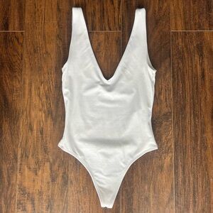 White deep-V neckline / double-lined bodysuit!